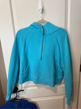 lululemon Turquoise scuba
SIZE M/L 
*small stain on front pocket shown in pic